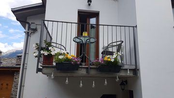 the balcony back of the house